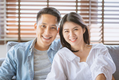 Portrait of a smiling young couple