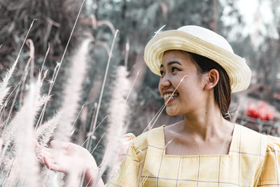 Happy woman enjoying the beautiful nature around her - woman concept and healthy natural lifestyle 