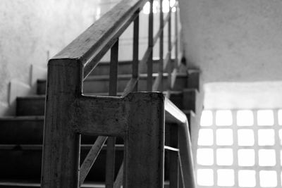 Close-up of metal railing against wall