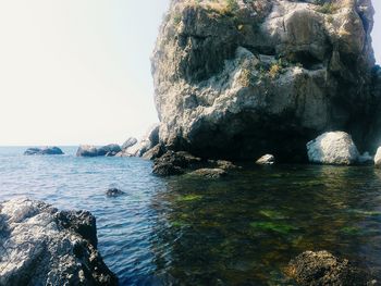 Sea waves splashing on rock