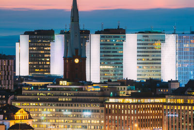 Modern buildings in city at dusk