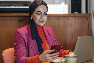 Muslim woman working from home
