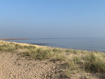 Scenic view of sea against clear sky