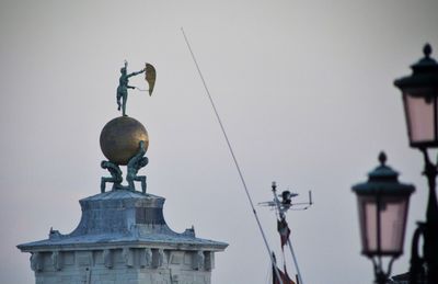 Low angle view of statue against clear sky