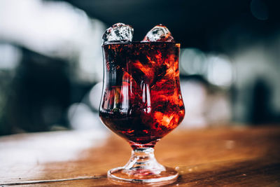 Close-up of beer glass on table