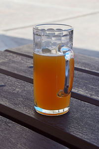 Close-up of beer in glass on table