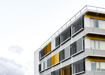 Low angle view of modern building against sky