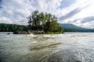 Scenic view of river against sky