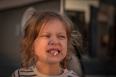 Portrait of cute girl smiling
