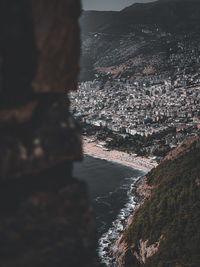 High angle view of river amidst buildings in city