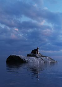 Building by sea against sky