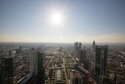 Aerial view of city buildings against sky