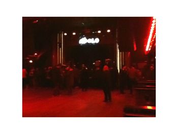 Blurred motion of people at night