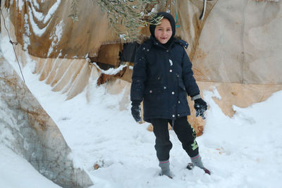 Syrian refugee children playing in the snow that fell on the camp near the syrian-turkish border.