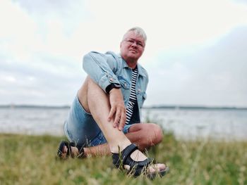 Full length of man on beach against sky