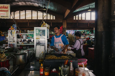 Panoramic view of people at market