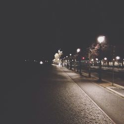 Illuminated street lights at night