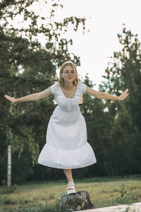 Elegance of a young woman maintaining balance, symbolizing both physical and mental wellness