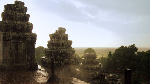 View of temple against cloudy sky