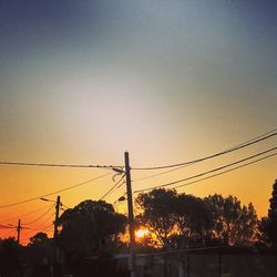 Electricity pylon at sunset