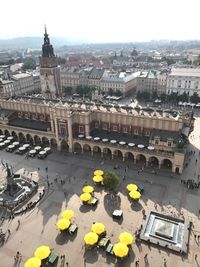 High angle view of crowd in city against buildings