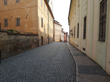 Narrow alley along buildings