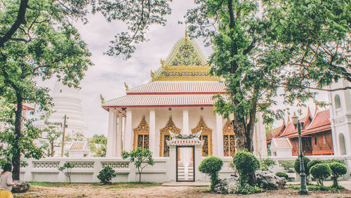 View of temple against building