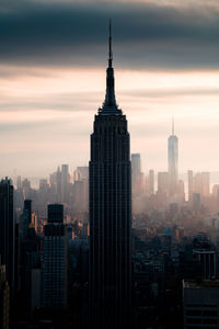 Modern buildings in city against sky