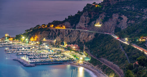 High angle view of illuminated city buildings