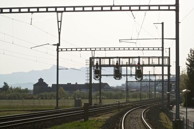 Train on railway tracks against clear sky