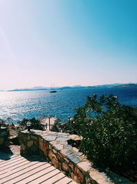 Scenic view of sea against clear blue sky