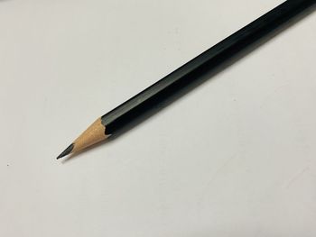 Close-up of pencil on white background