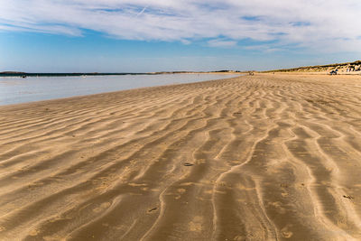 Footprints on sandy beach