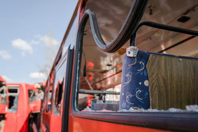 Close-up of vintage car against blue sky