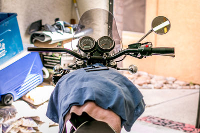 Close-up of motorcycle at garage