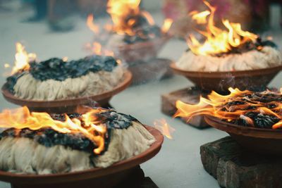 Close-up of bonfire on barbecue grill