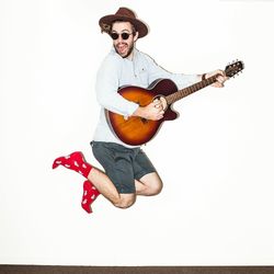 Portrait of young man over white background