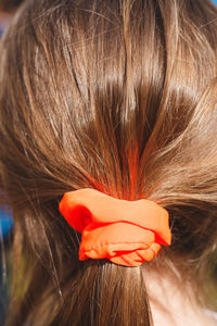 Rear view of woman with orange hair