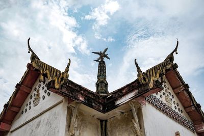 Low angle view of statue against sky