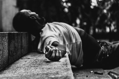 Man sleeping on steps