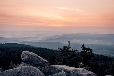 Scenic view of mountains against sky during sunset