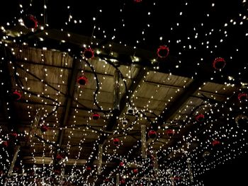 Close-up of illuminated christmas lights at night