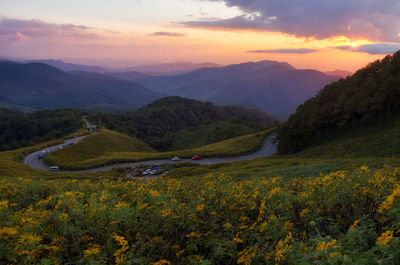 Scenic view of mountains against sky during sunset