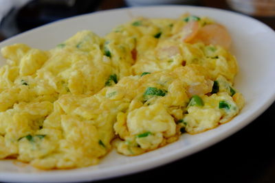 Close-up of rice with vegetables in plate