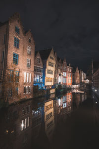 Illuminated buildings in city at night