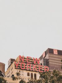 Low angle view of buildings against clear sky