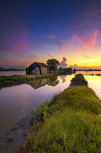 Scenic view of landscape against sky during sunset