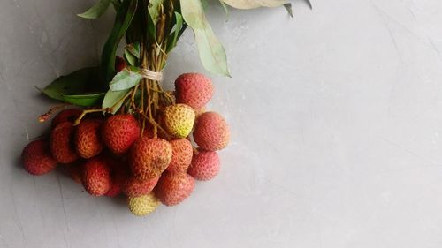 High angle view of strawberries on table