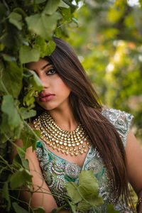 Portrait of young woman looking away