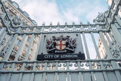 Low angle view of text on building